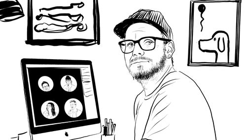 A drawing of Bedwyr sat by his desk with some digital drawings on the computer